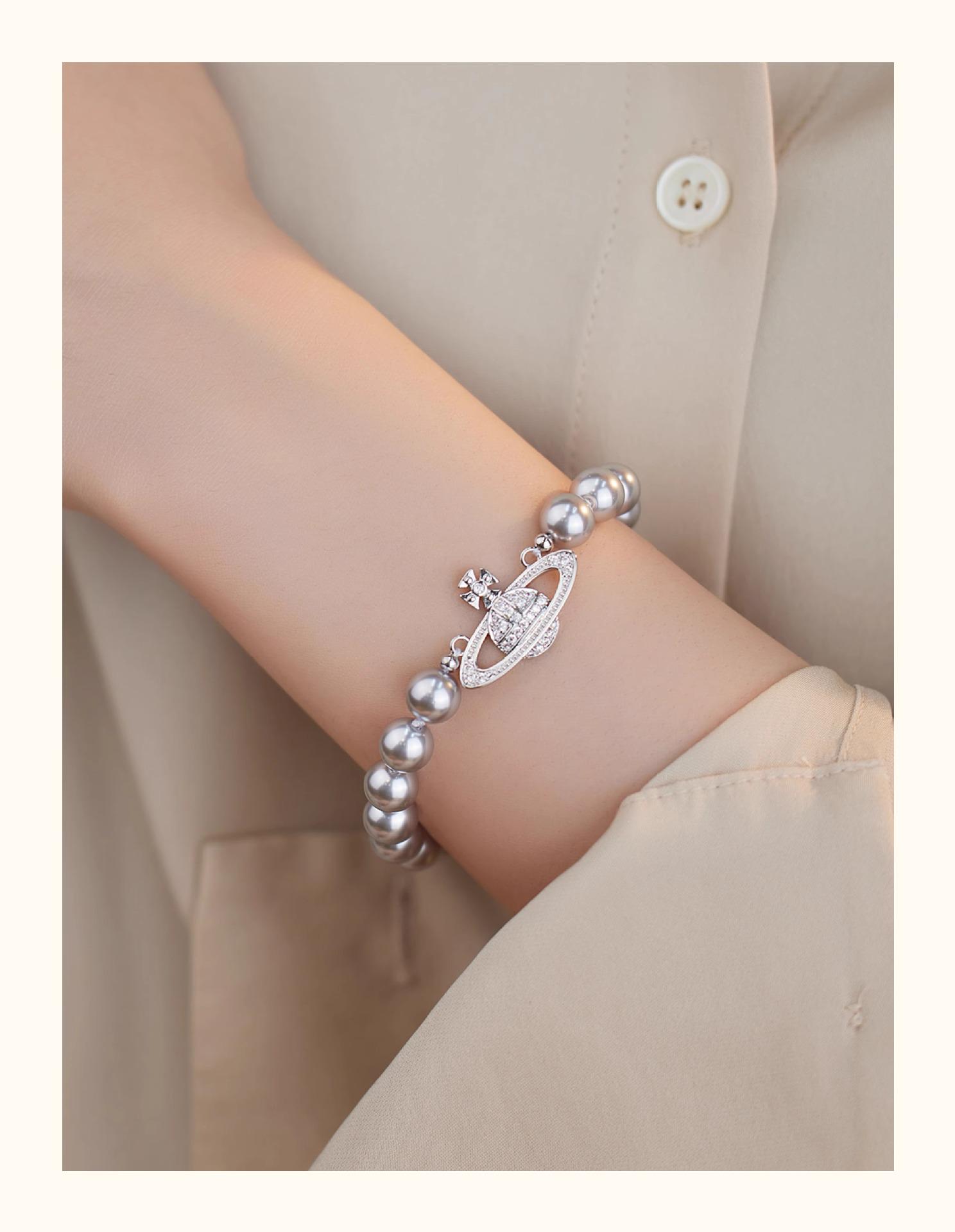 

Перловий браслет «Імператриця Діамантів Сатурн» та набір чокерів «Вівіан» - Ювелірні вироби легкої розкоші