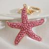 Elegant Crystals Embedded Sea Star Keychain Versatile Alloy Accessory for Women