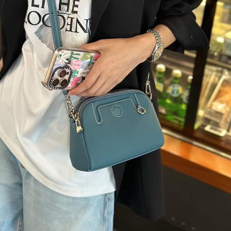 

Niche Design New Genuine Leather Women s Bag Spring Summer Versatile Top Layer Cowhide Women s Shoulder Crossbody Simple Trendy Small Practical Bag 19*14*7 джинсовий синього кольору