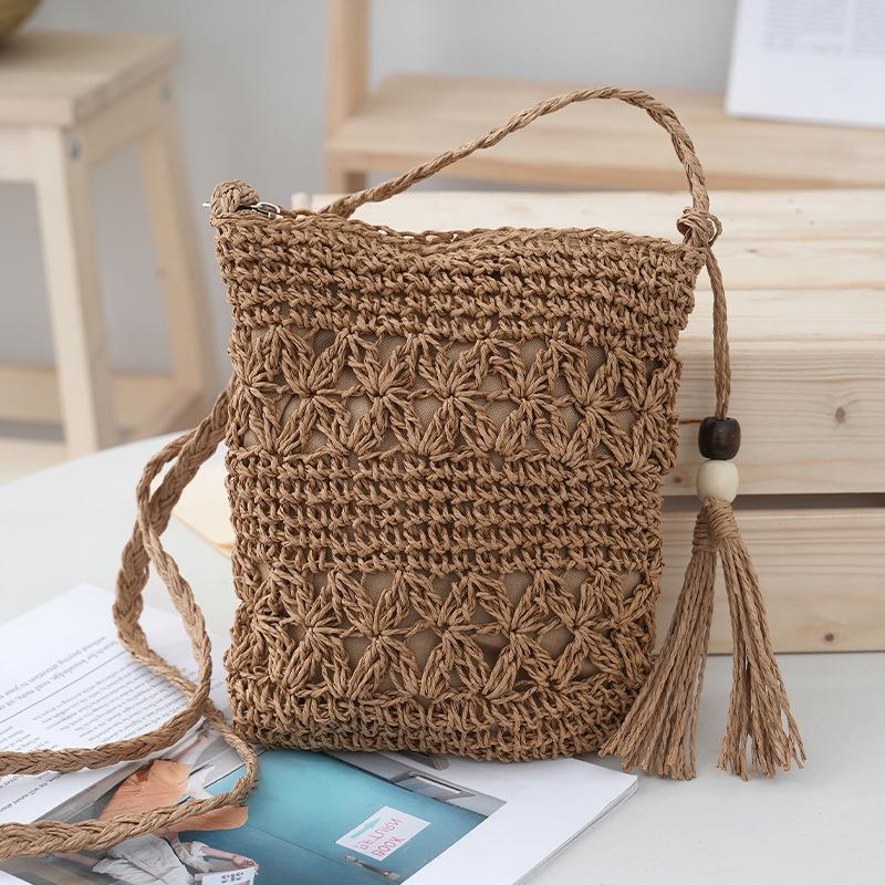Factory wholesale straw woven bag hollow woven women s shoulder portable messenger bag straw woven beach travel simple leisure bag 20*22
