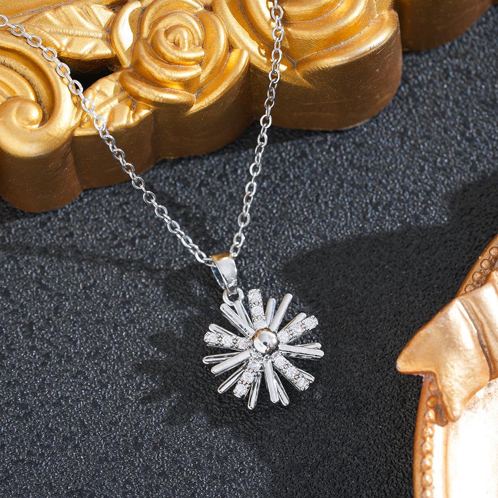 Women's Snowflake Rotatable Necklace: Gold-Plated Copper with Titanium Steel Pendant.