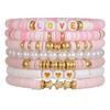 Korean version of fashion new multi-layer elastic thread soft pottery love smiley face bracelet set retro handmade pearl jewelry women