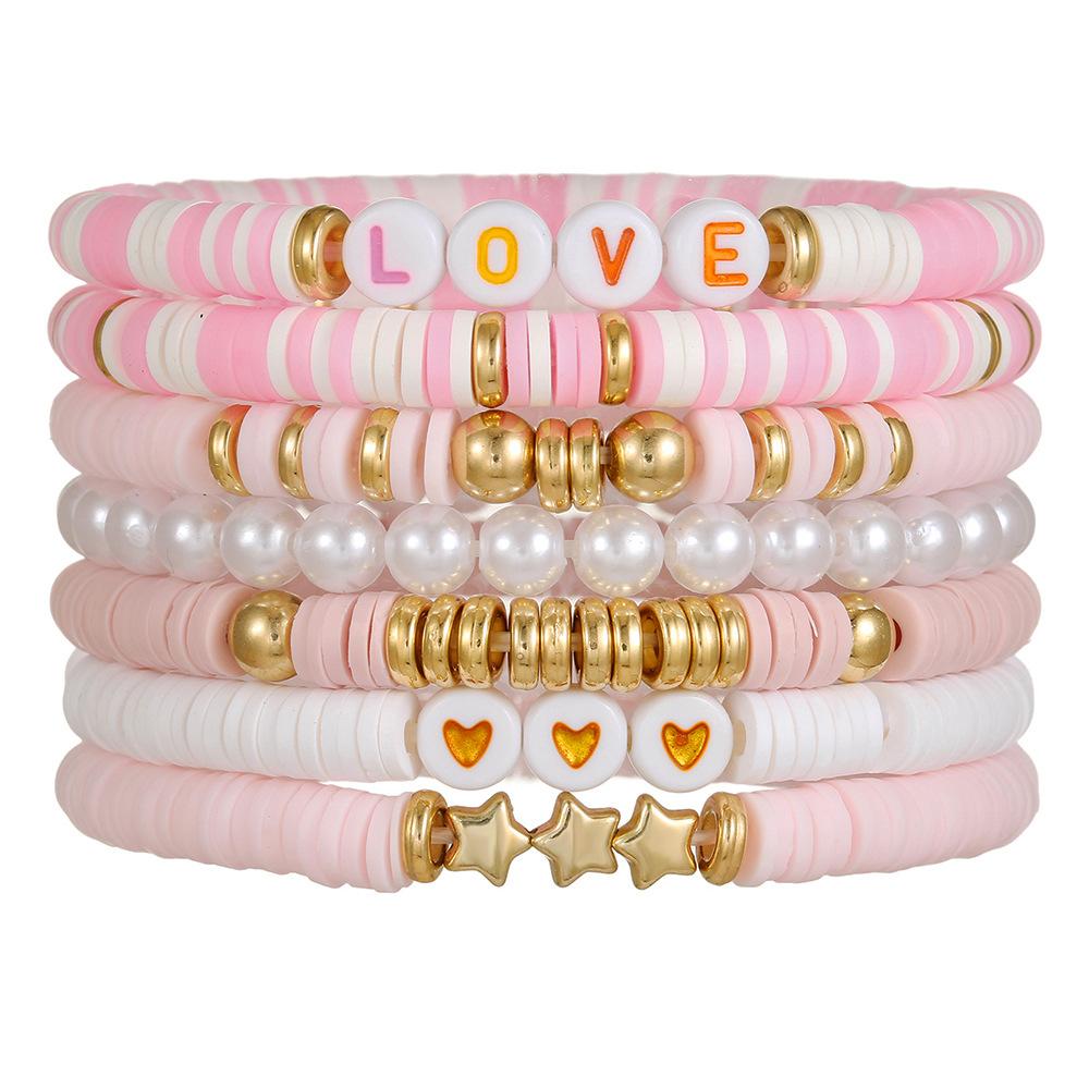Korean version of fashion new multi-layer elastic thread soft pottery love smiley face bracelet set retro handmade pearl jewelry women