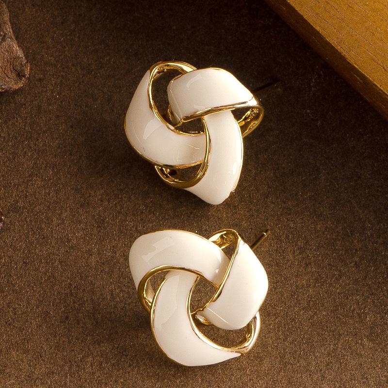 

French exquisite niche design feeling oil dripping knotted geometric triangular stud earrings femininity simple high-end earrings