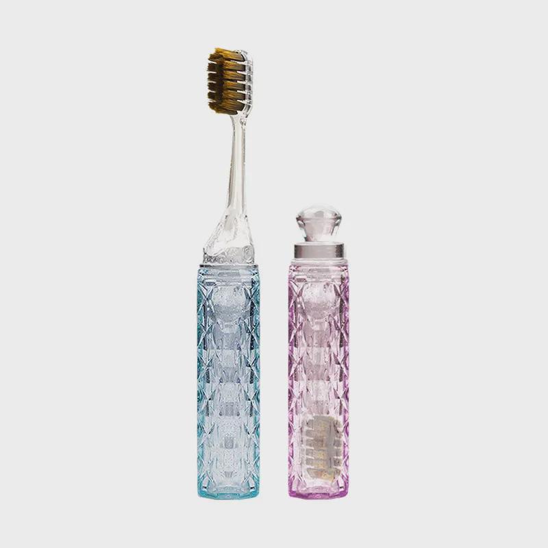Brosse à dents de voyage compacte à poils souples et manche en cristal