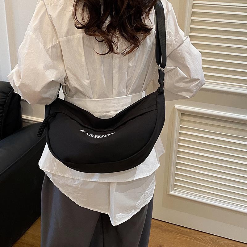 2025 spring and summer new large-capacity dumpling bag women's trend simple embroidery thread letter underarm bag campus travel bag