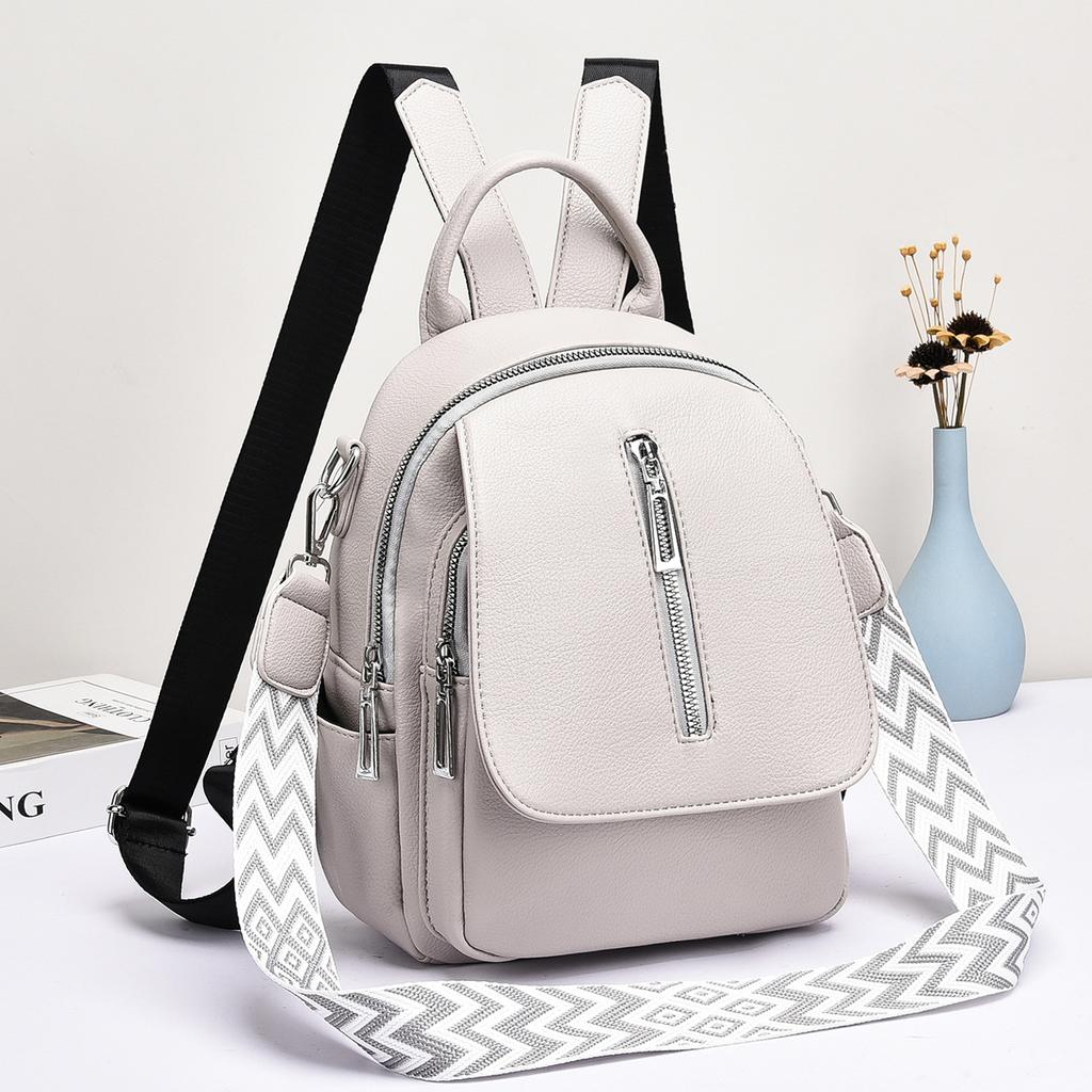 Backpack women's trendy women's bag texture solid color travel bag PU material