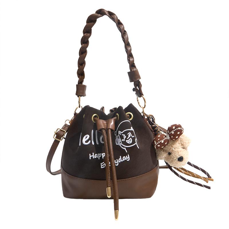 Contrasting color splicing women's bag 2026 new fashion trend retro style versatile casual simple portable messenger bucket bag