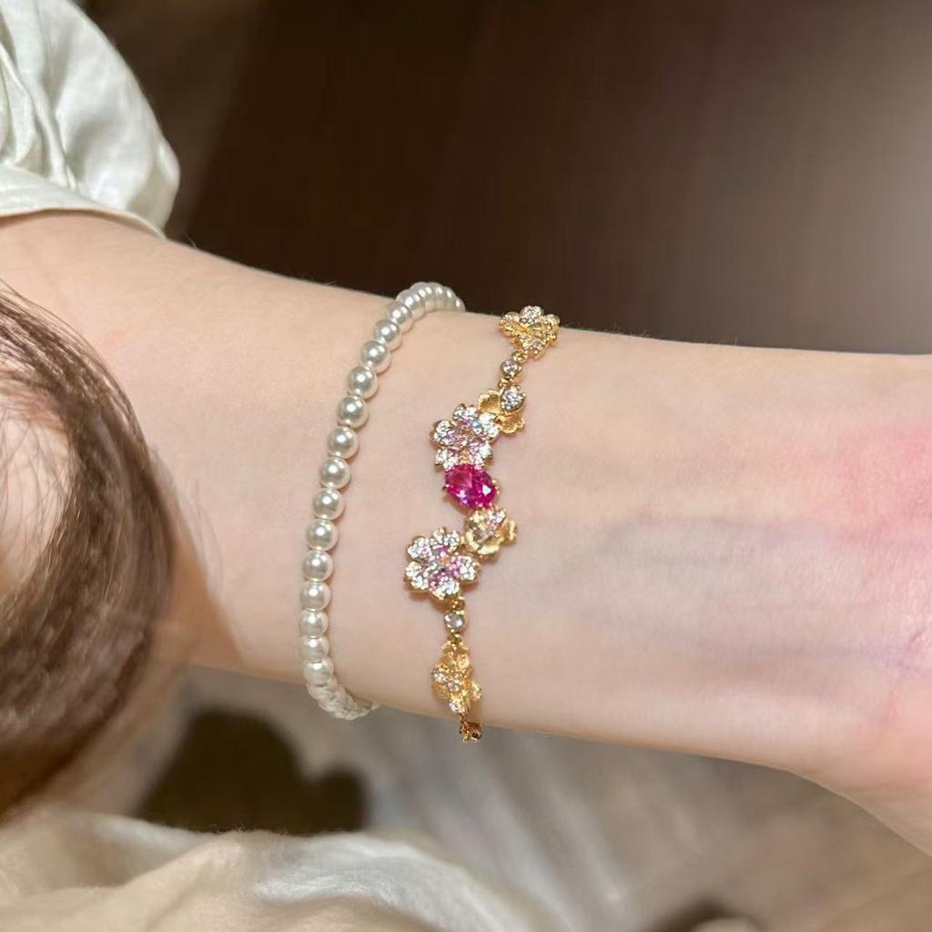 2026 Light Luxury Premium Brushed Flower Bracelet Retro Flash Diamond Paraiba Retractable Bracelet Women