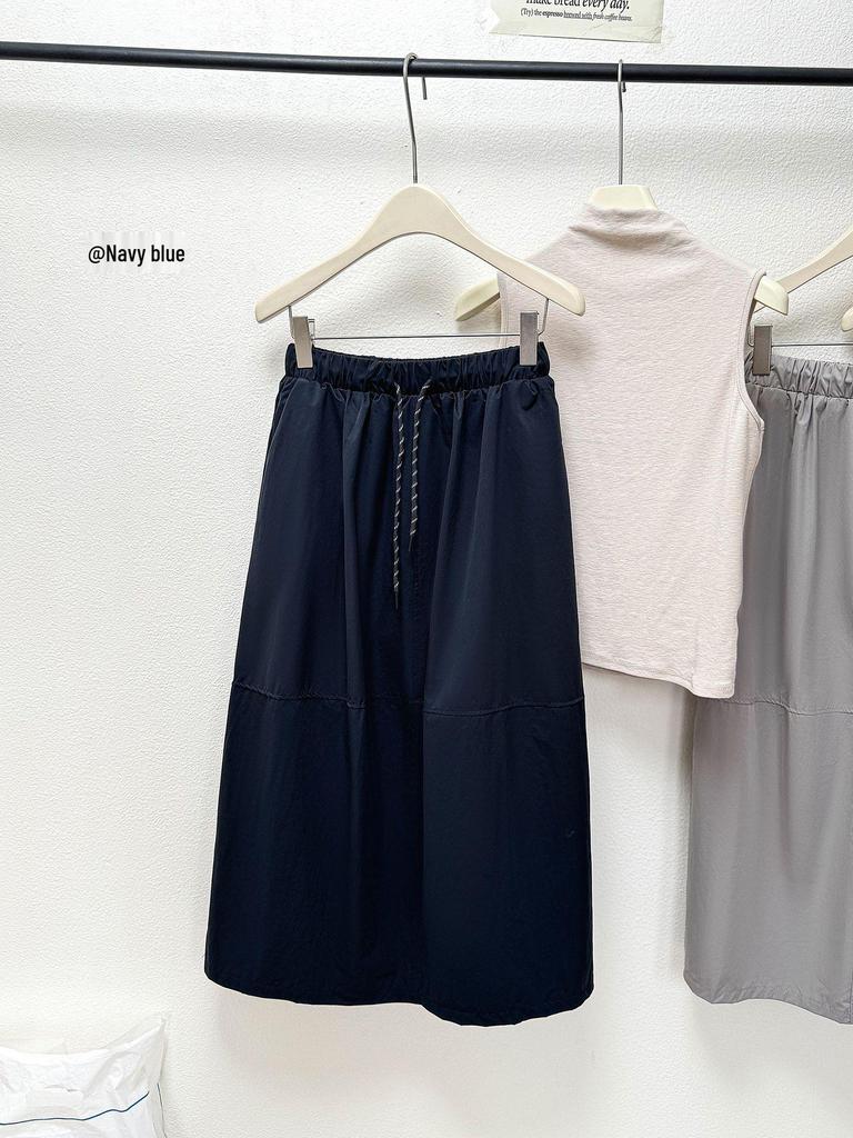 2026 Spring/Summer Retro Cocoon Mid-Length Elastic Waist Skirt - Stylish Solid Color Artistic Bud Design