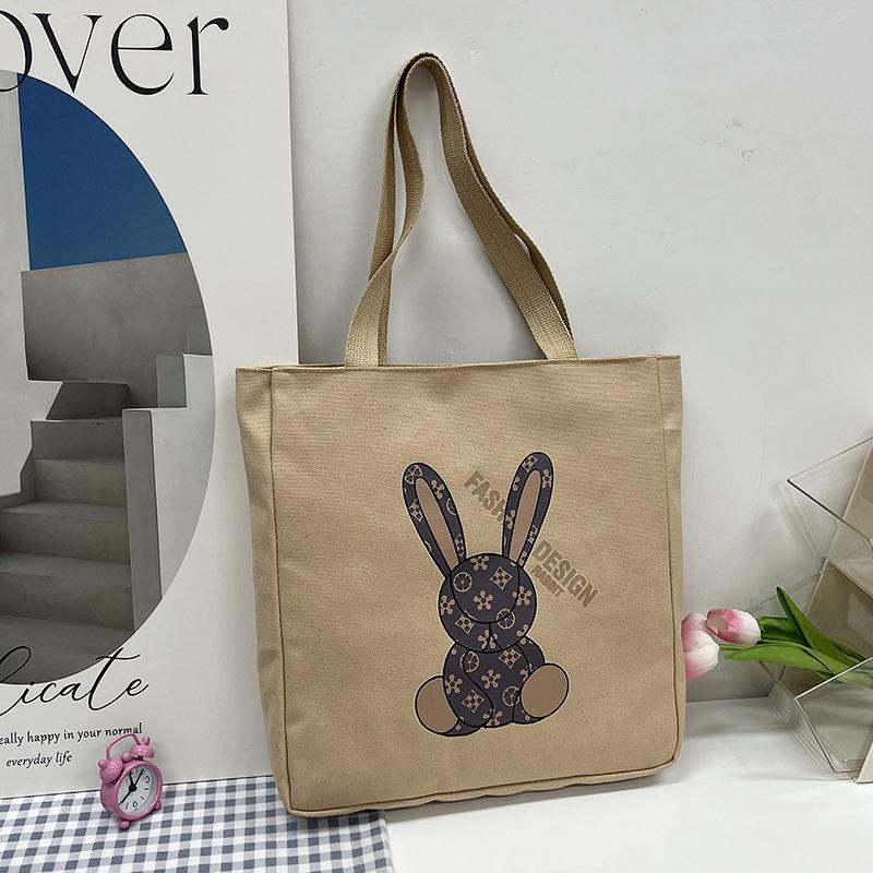 Large capacity canvas bag casual shoulder bag new fashion Harajuku simple cartoon cute tote bag