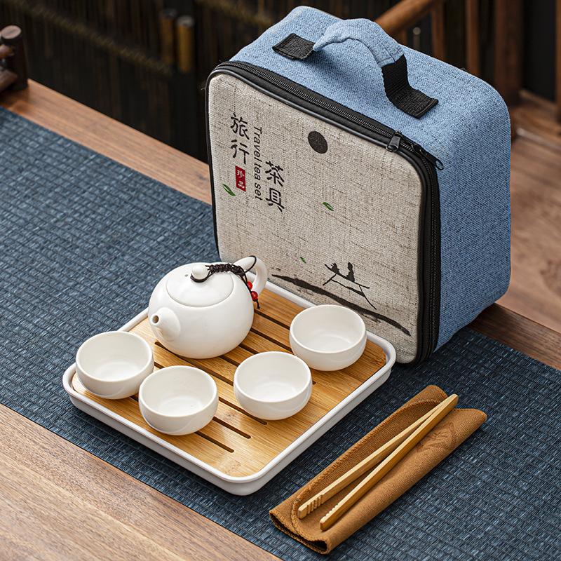 Travel bag, ceramic kung fu tea set, one pot, four cups, melamine tea tray, a complete set of portable business gifts, meeting