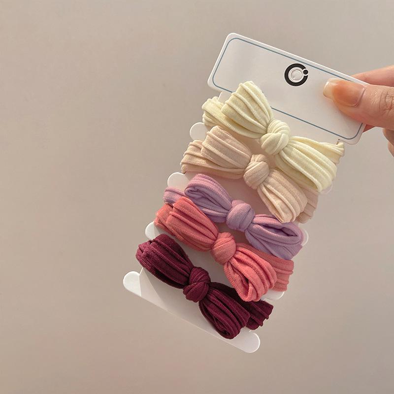 

2025 Новая женская резинка для волос с бантом - Высокая эластичность и прочная резинка, покрытая кожей