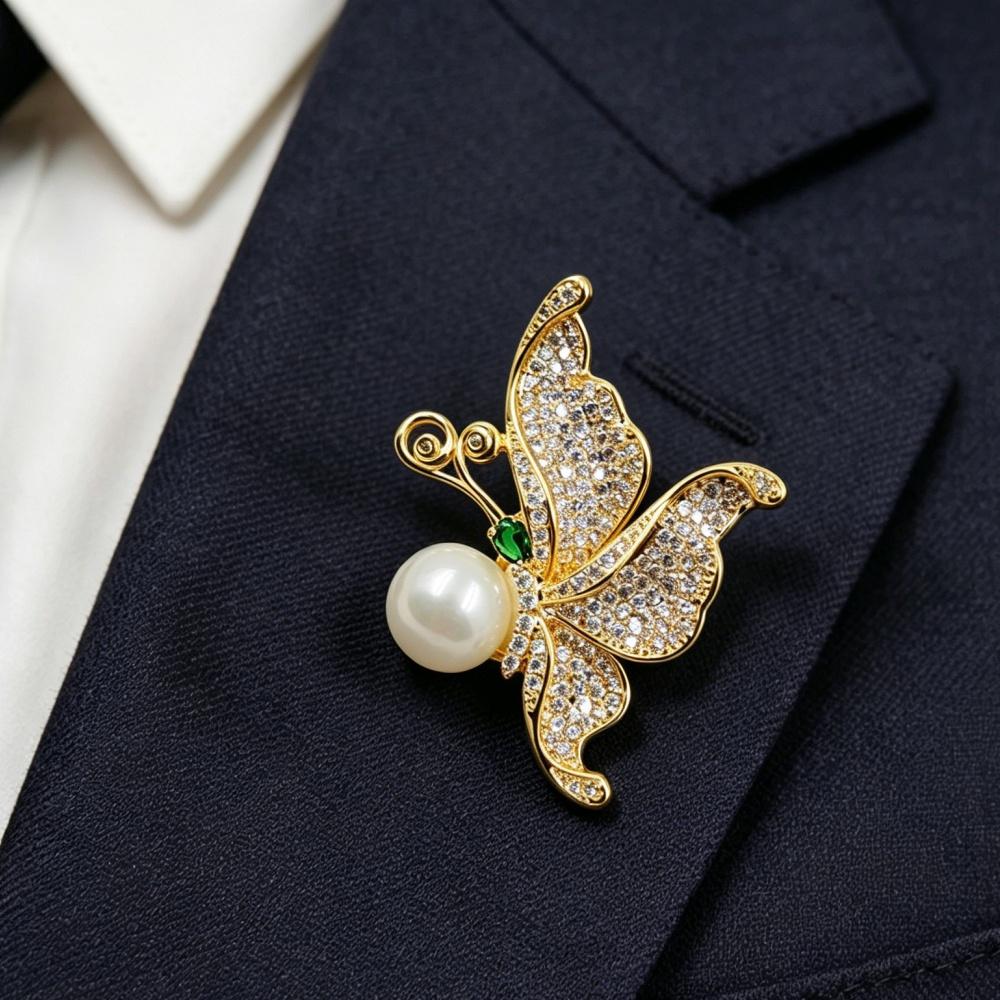 

Elegant natural freshwater pearl brooch, butterfly shaped design, natural luster shining. Using copper material with zircon accents.