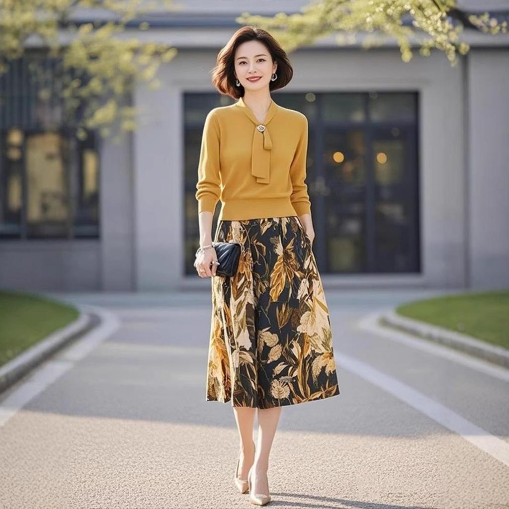 Yellow Knitted Two-Piece Set: Tie-Up Top & Printed Midi Skirt for Spring 2025 Women