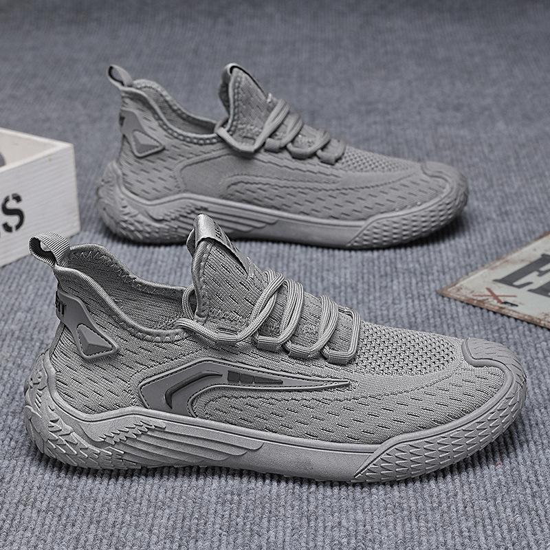 Kokosskor herrskor sommar nya andningsbara flugvävda meshskor herrarnas trend mångsidiga sportskor avslappnade löparskor