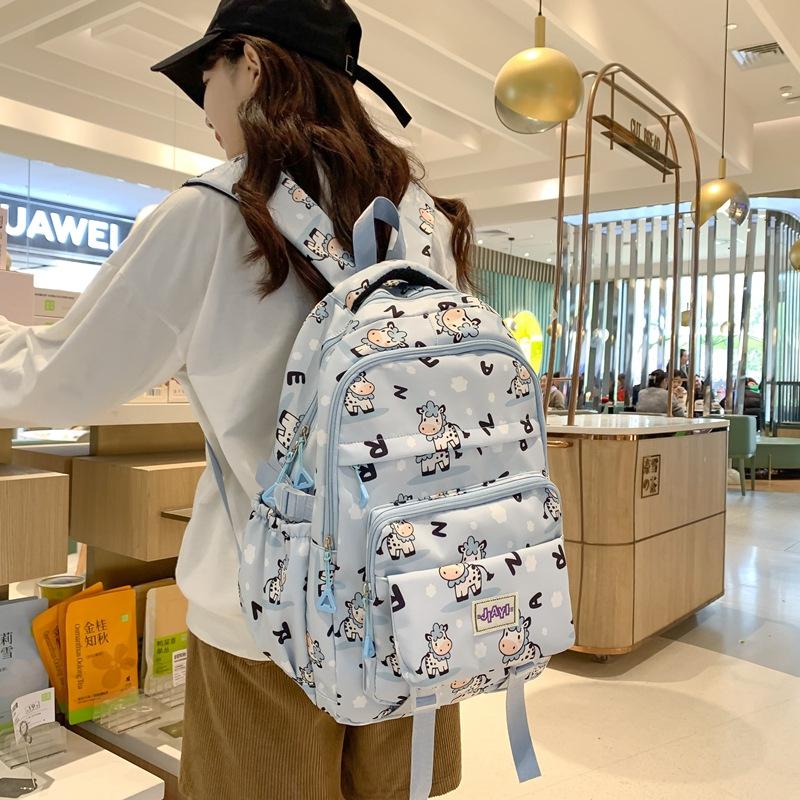 Schoolbag New Backpack Japanese Versatile Printed Calf Junior High School Girls College Students Cute Large Capacity Backpack Oblique Span Bag