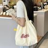 Tasche mit Buchstabendruck Bequeme Kordelzugtasche Große Kapazität Lässige Tasche Weich Zum Ausgehen Kurze Ausflüge Reisen