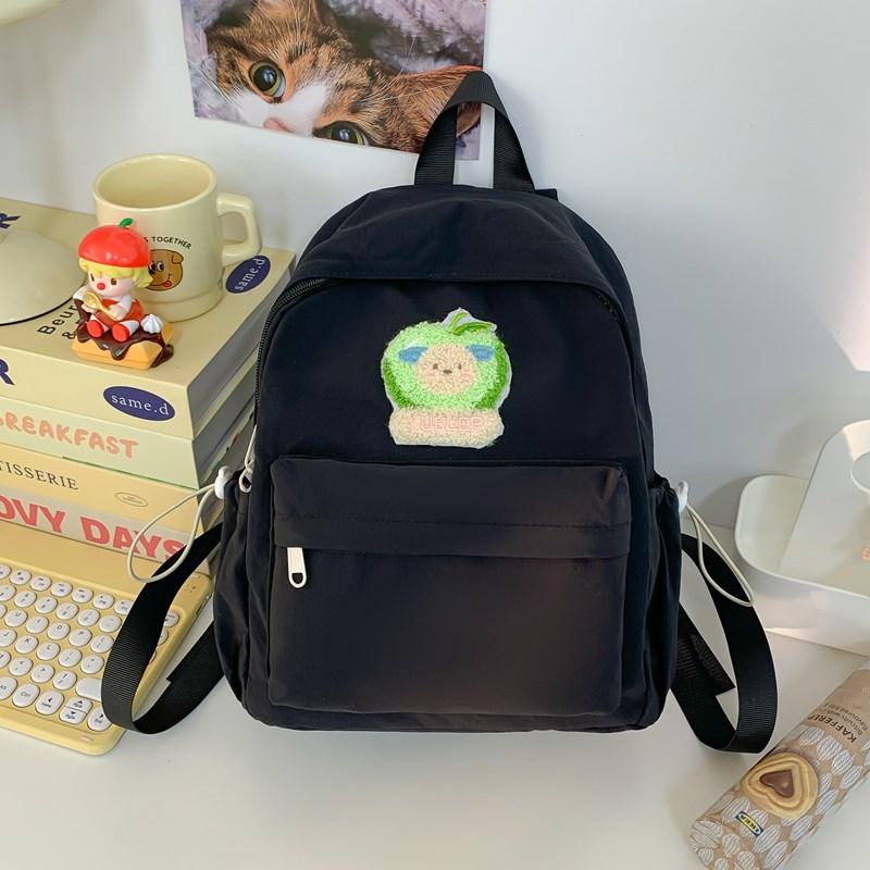 The new schoolbag is high-value, fresh and sweet, candy-colored backpack, lightweight and large-capacity backpack for junior high school students.