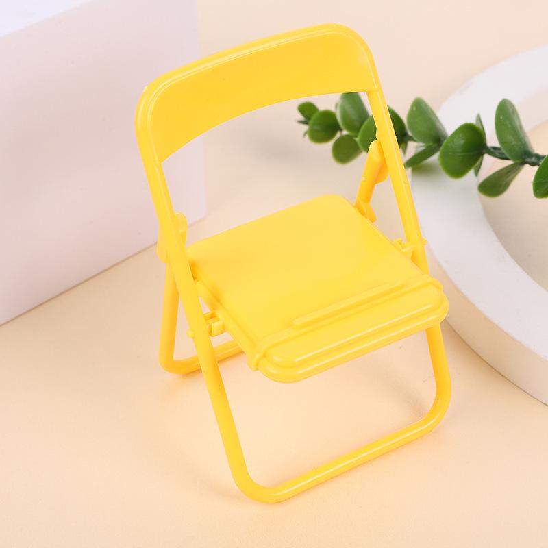

Cute Small Chair Phone Stand: Creative and Compact Mobile Holder for Desktops. Transparent OPP Bag Packaging жёлтый