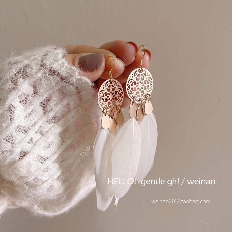 

Bohemian Ethnic Tassel Earrings for Women - Exotic Holiday Style Studs from Tibet, Xinjiang, Yunnan