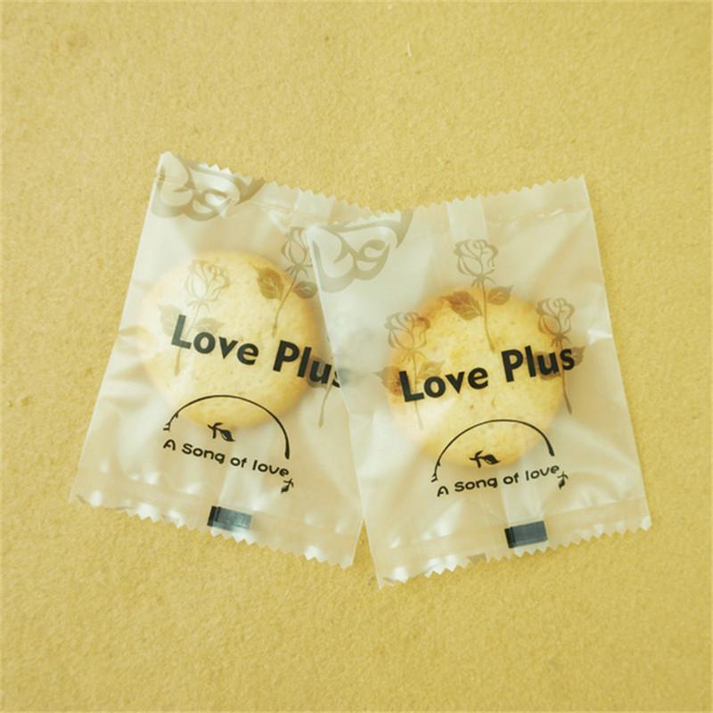 100 Stück Neue Schneeflocken-Knusperverpackung Blumentee Kekse Nougat Maschinell versiegelt Transparente Gefrostete Beutel Weihnachtsgeschenkverpackung