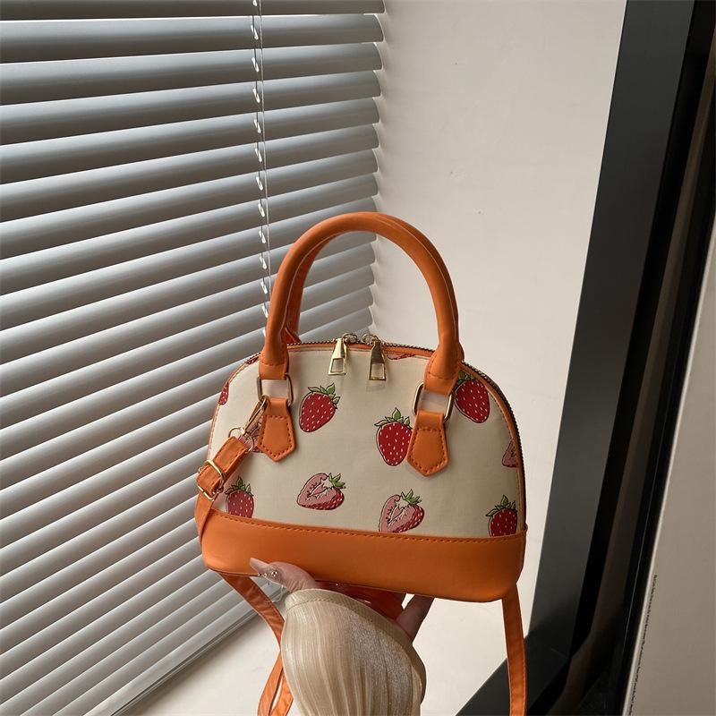 

Новая модная женская сумочка, модная сумка-ракушка с клубничным принтом, текстурная сумка через плечо, сумка подмышку оранжевый