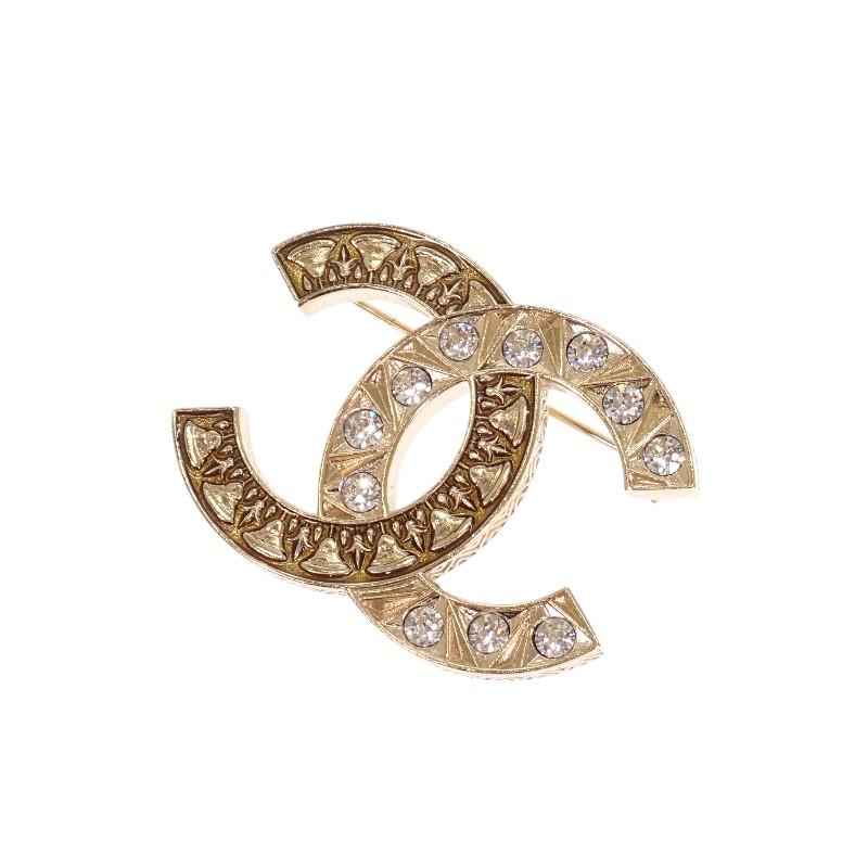 CHANEL  Brooch gold metal Women