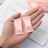 Compact Disposable Facial Towel - Candy Style Portable Cleansing Wipes for Travel, Business Trips, and Catering.