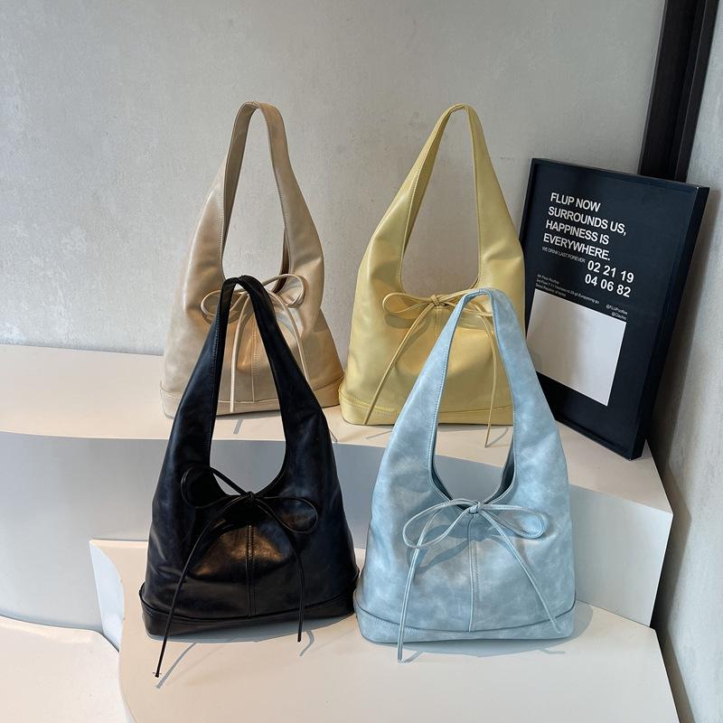 Koreanische, stylische Handtasche mit großem Fassungsvermögen und Schleifenverschluss – trendiges Design für Damen
