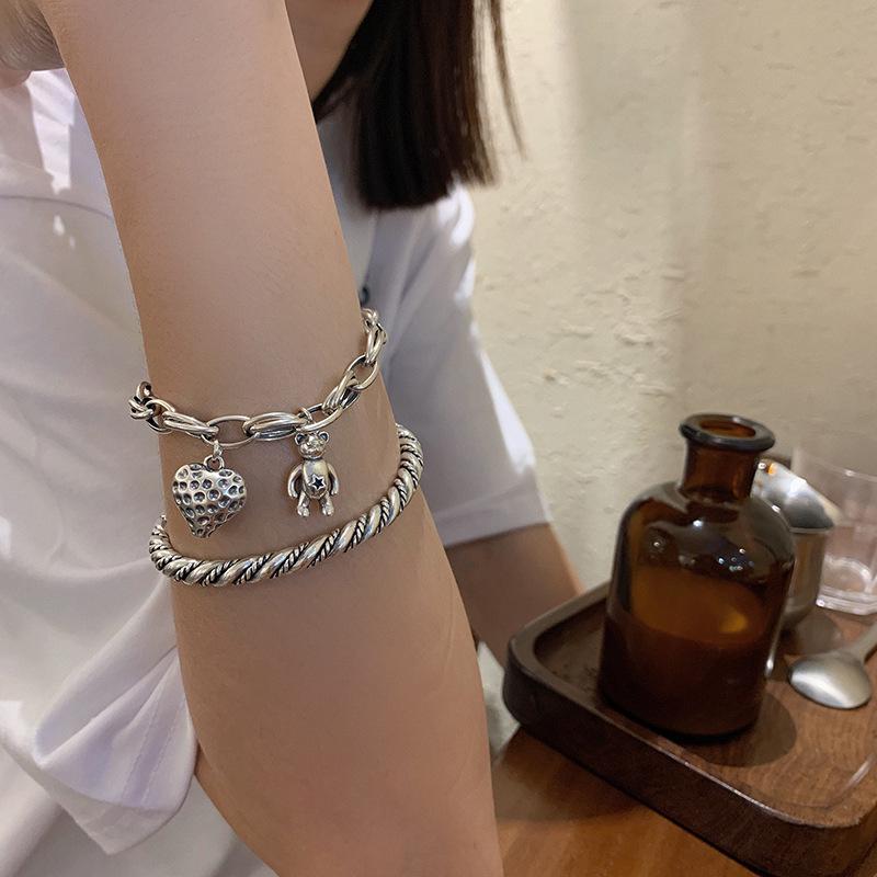 S925 Vintage Strawberry Bear Woven Bracelet for Women - Stylish and Versatile Design.
