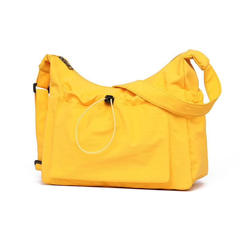 

Женская стильная сумка кроссбоди на кулиске, модная сумка-слинг с надежной молнией и декоративным брелоком жёлтый