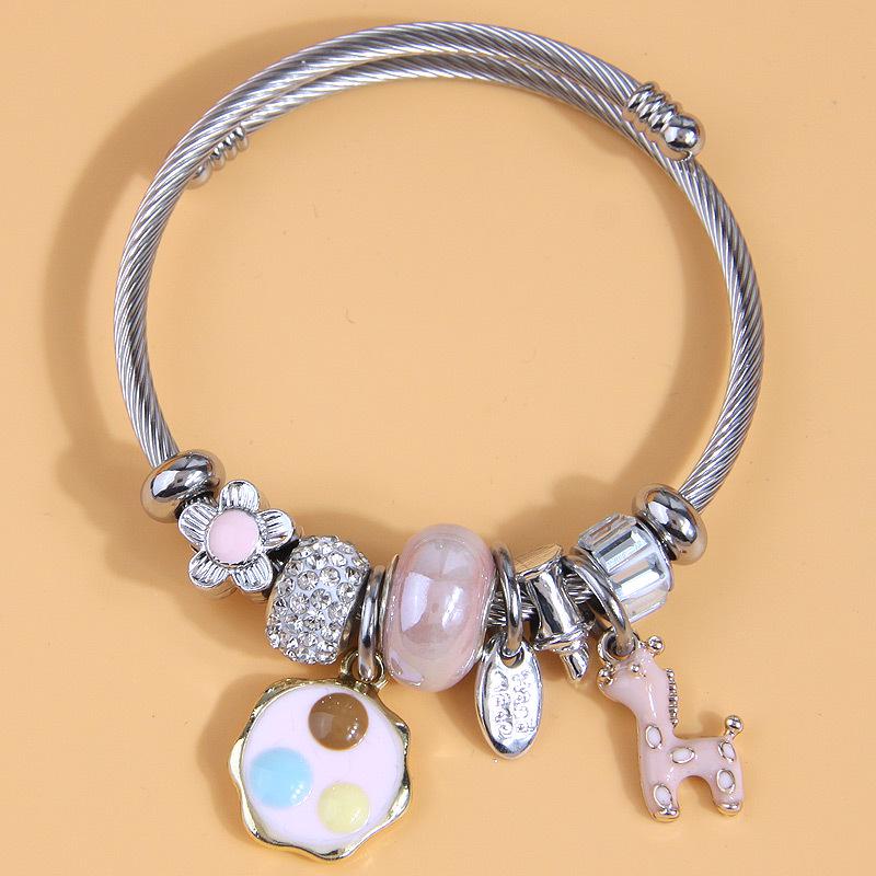 

Елегантний жіночий браслет Pandora з різдвяним кулоном-оленем