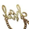 Chanel Pierce Gold Metal Women