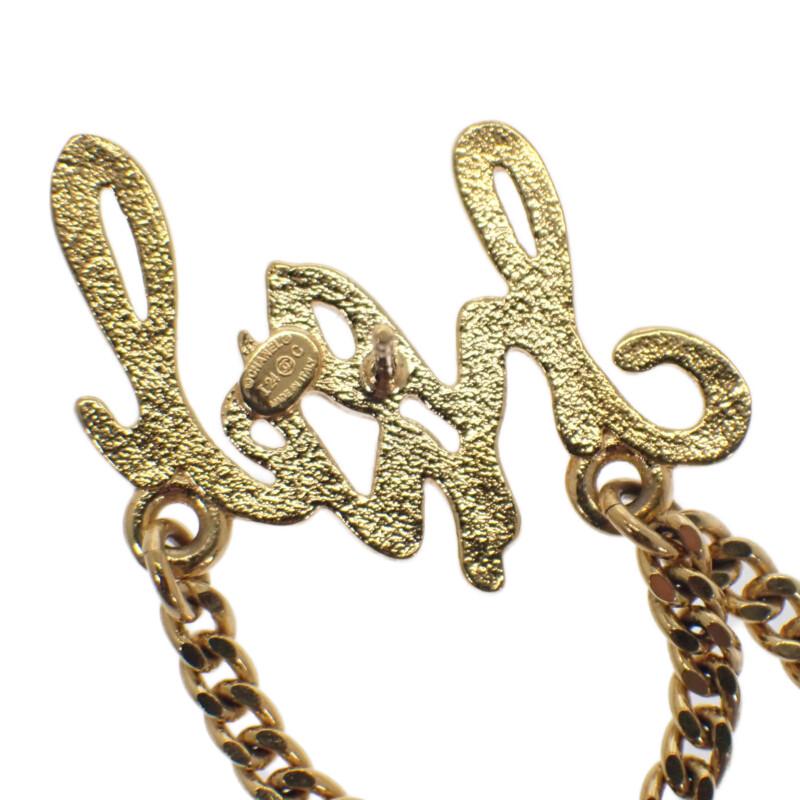 Chanel Pierce Gold Metal Women