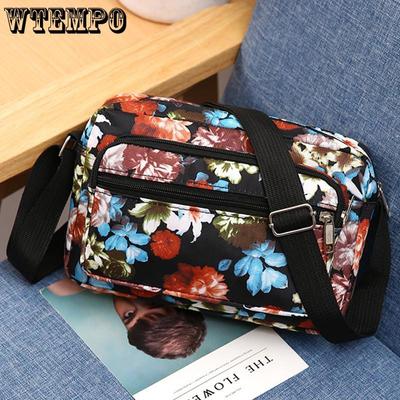 Korejská verze ležérní nylonová plátěná taška pro střední a starší věk crossbody taška módní a všestranná taška přes jedno rameno pro matku malá látková taška s květinovým vzorem