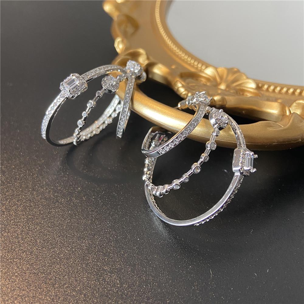 Silver needle zircon geometric oval hollow three-layer earrings French court style stud earrings light luxury earrings women