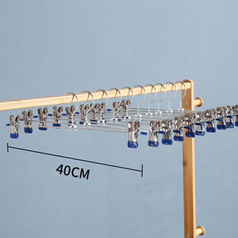 Traceless Non-Slip Trousers Rack: Stainless Steel Clothes Hanger with Skirt Clips for Home Storage & Drying.