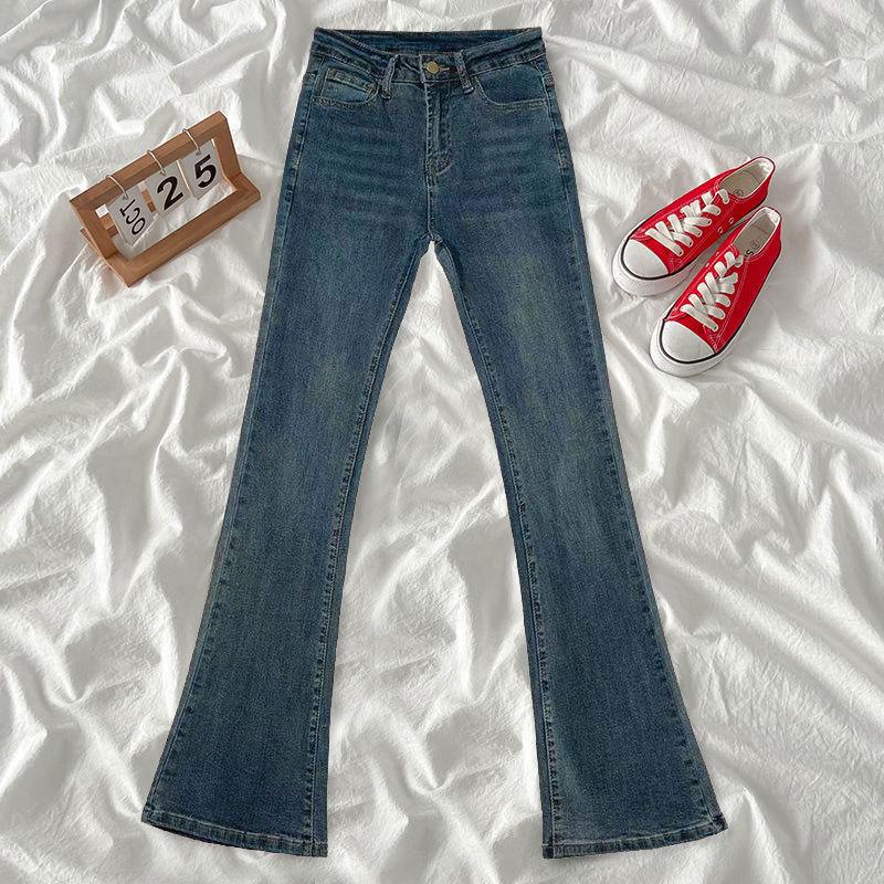 Schwarze Schlagjeans mit hoher Taille für Damen – Slim Fit, elastisch, Herbst/Winter.
