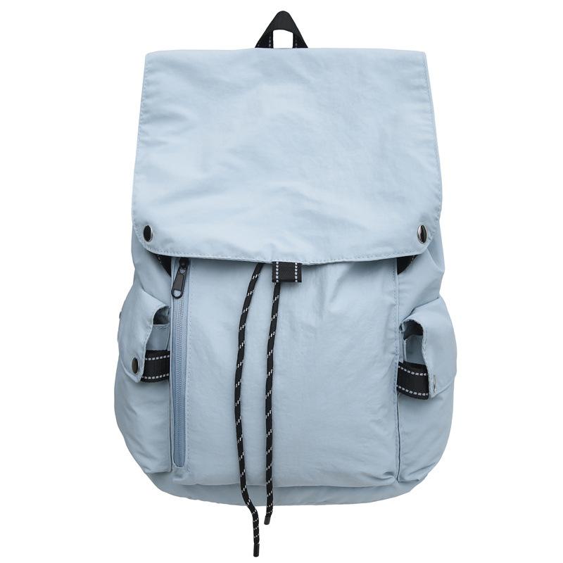 2025 new Korean niche casual simple style solid color backpack women's commuting versatile large-capacity student schoolbag