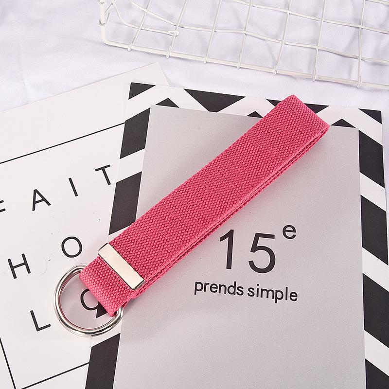 

Молодіжний парусиновий ремінь унісекс із подвійним кільцем – стильний, універсальний і модний однотонний аксесуар 110cm x 3.8cm рожевий червоний колір