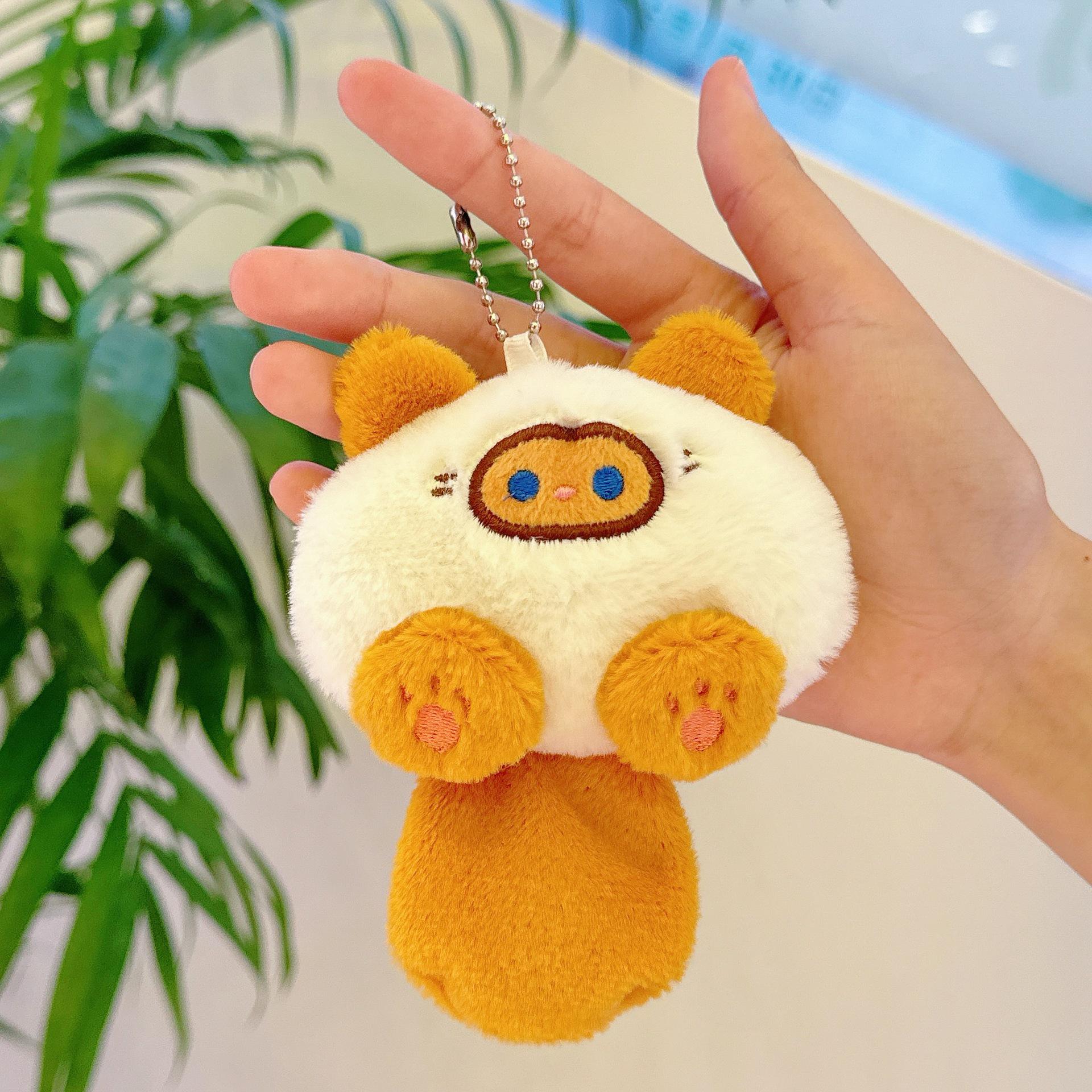 

Очаровательный пищащий плюшевый брелок-шарм в виде котенка Height approximately 12 cm