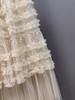 Spring 2026 Women's Irregular Layered Mesh Skirt: Long, Slimming Gauze Design, Heavy Work Detail.