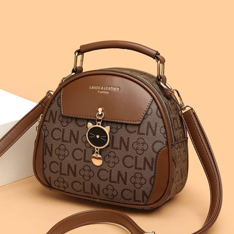 2025 Wszechstronna Okrągła Torba Crossbody i do Ręki z Miękkiej Skóry