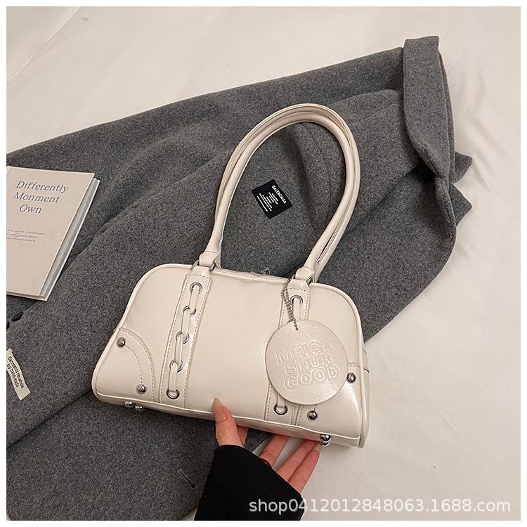 

2025 новая высококлассная сумка-подушка под мышкой, нишевый дизайн, сумка-мессенджер для通勤, женская сумка для ручной носки, сумка Boston белый