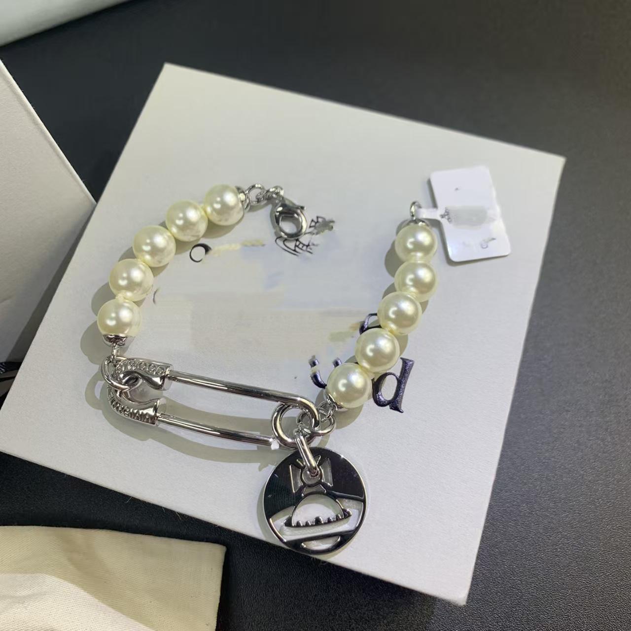 

Empress Dowager Cixi Pearl Pendant Necklace & Bracelet Set