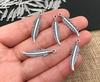 ALIMITOPIA 100pcs Alloy Feather Charms Pendants Easter Angel Wing Feather Dangle Charm for DIY Crafting Bracelet Necklace Jewelry Making Findings