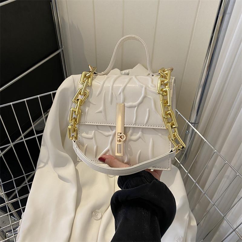 Borsa a tracolla alla moda in stile urbano in pelle PU con catena, piccola borsa morbida in più colori