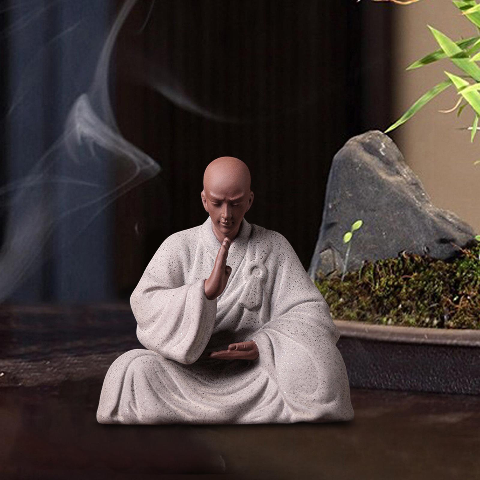 Collection of sculptures of Buddhist monk figures in ceramic clay,