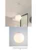 Minimalist Rotating Stair Chandelier: Irregular Long Duplex Pendant with Large Round Ball in Cream